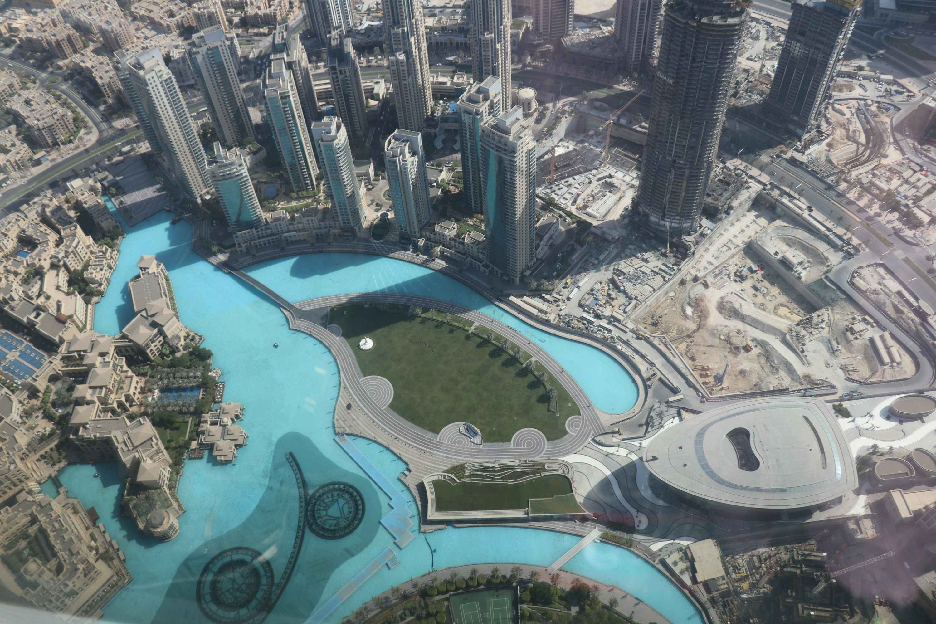 Top view of blue water with high rise buildings