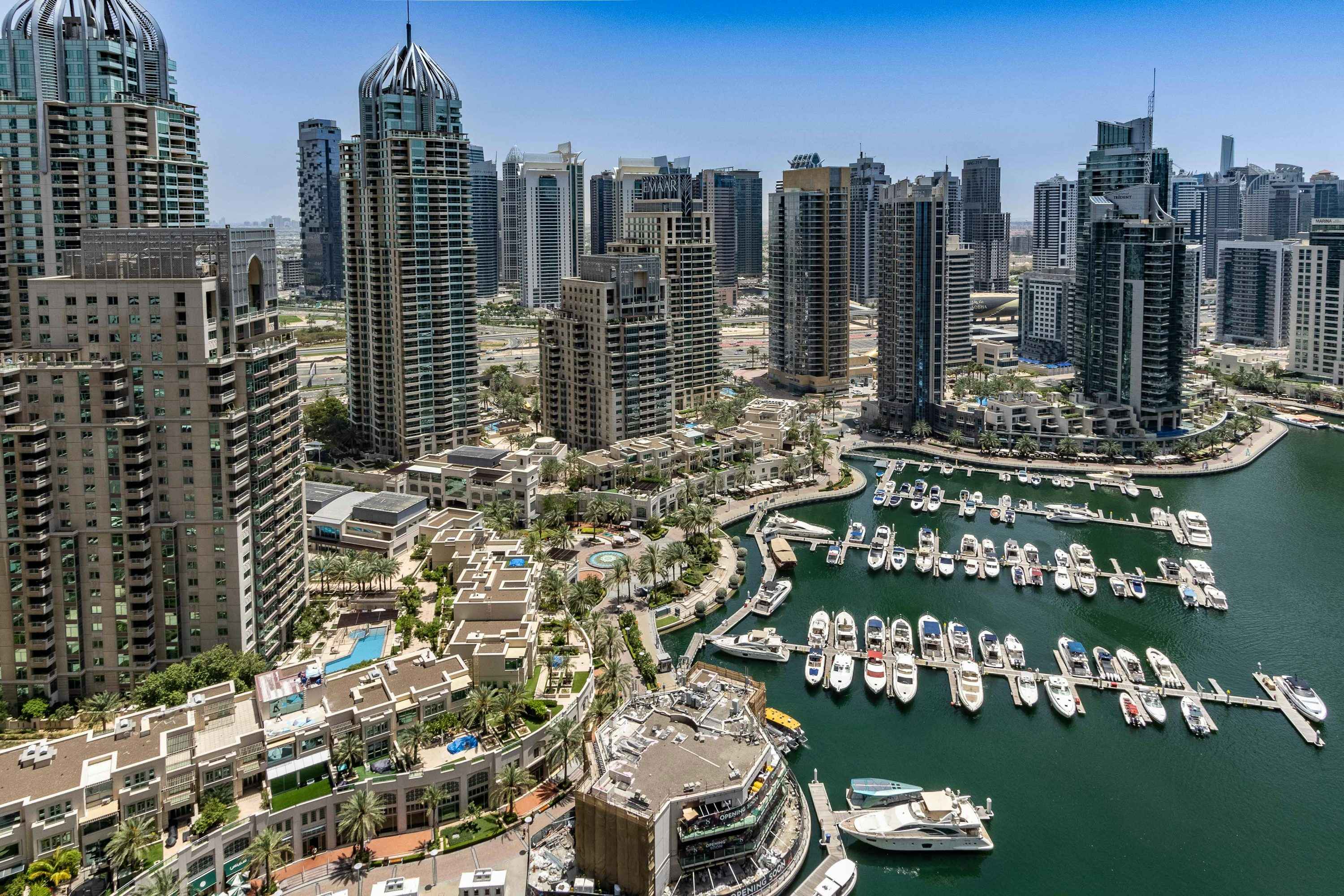 Aerial view of city with boats in the water